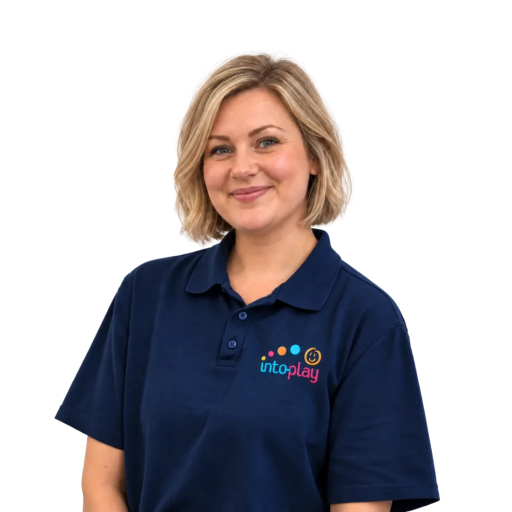 A smiling Into-Play team member in uniform